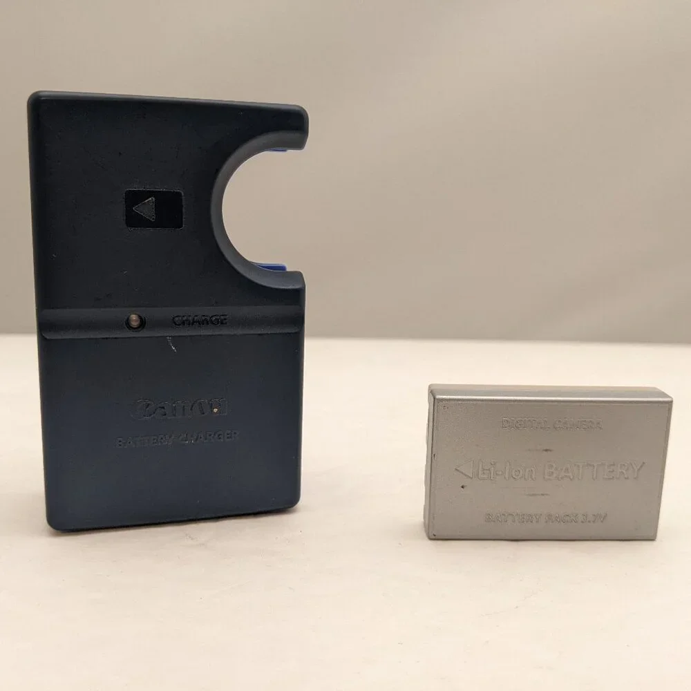 CANON CB-2LS Charger & Digital Concepts BP-1LHCL Rechargeable Li-Ion Pack USED